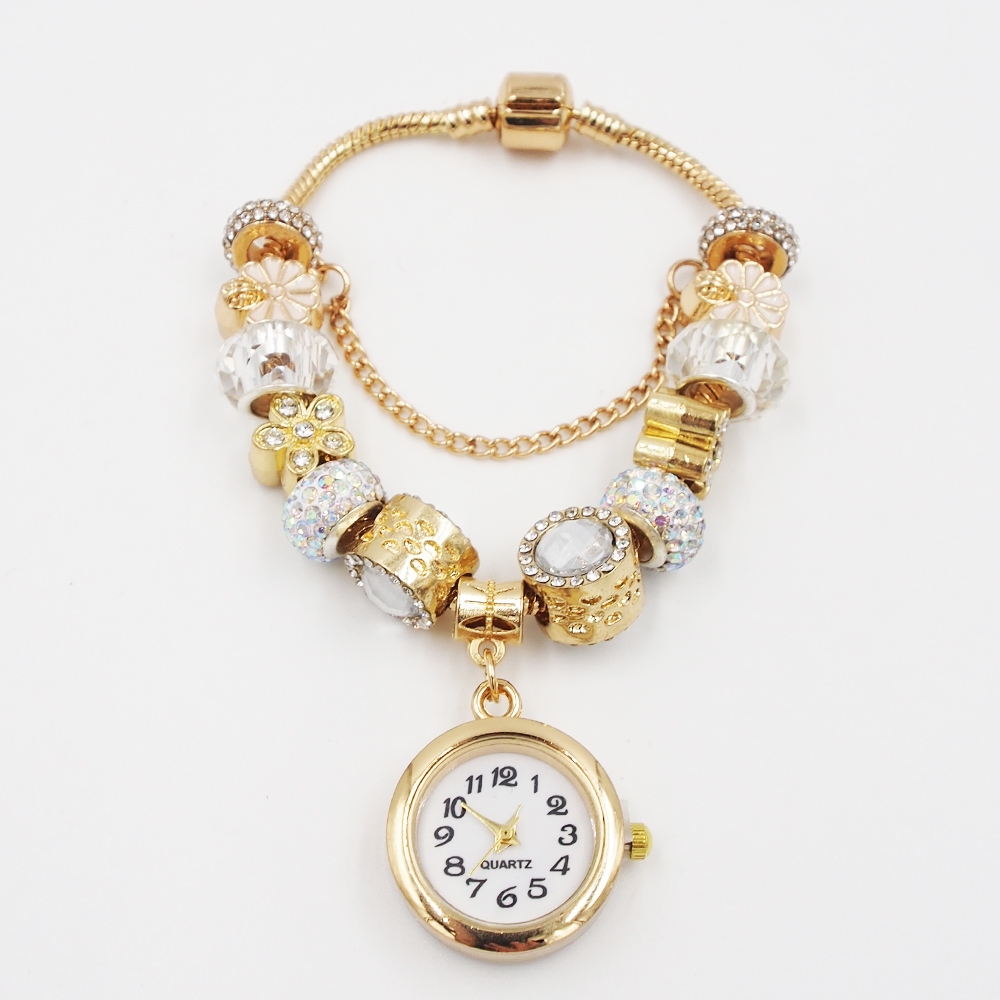 Aukso spalvos apyrankė su laikrodžiu